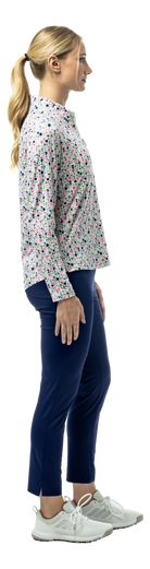SanSoleil SOLSHINE foil print long sleeve mock top in silver with a shiny, reflective design and quarter-zip neckline.