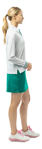 SanSoleil SOLMELANGE 1/4 zip long sleeve mock shirt in white with varsity green and pink trim, print design, casual style.