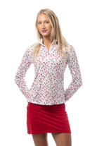 Woman wearing a white blouse with red Canadian Flag pattern and a red skirt on a white background.