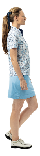 SanSoleil SOLTEK LUX short sleeve print mock shirt featuring blue fairway flowers design, sleeveless style, vibrant floral pattern.